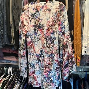 Charlie Jade long sleeve floral romper.